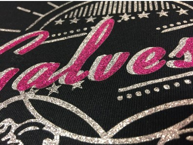 closeup on a portion of glitter T-shirt logo